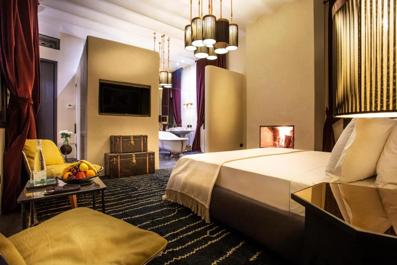 Suite Amal · Una suite generosa de 52 m², cama king size y un baño pensado para prolongar cada momento de descanso.